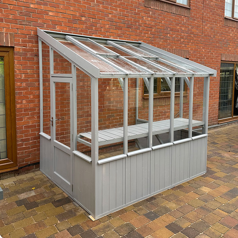 Product photograph of 4 2 X 4 9 Coppice Hatfield Lean To Painted Wooden Greenhouse 1 27m X 1 45m from Buy Sheds Direct