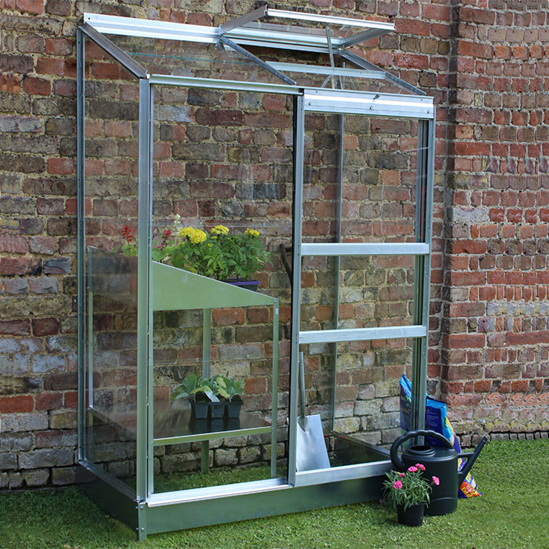 Product photograph of 4 4 X 2 4 Halls Wall Garden 24 Small Greenhouse 1 32 X 0 69m from Buy Sheds Direct