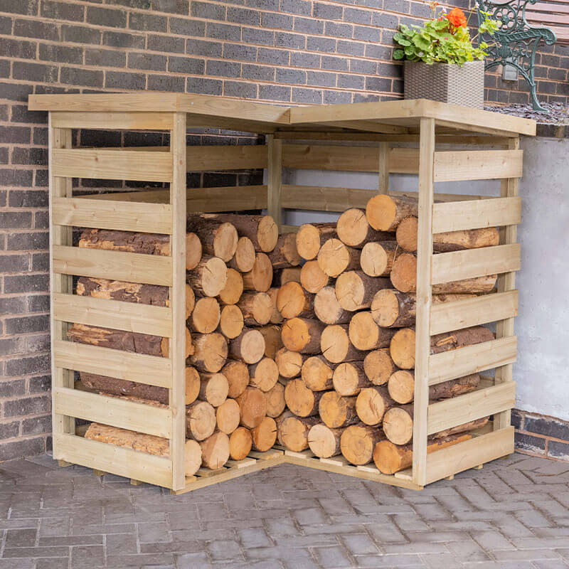 Product photograph of 4 3 X 4 3 Forest Pent Corner Logstore 1 3m X 1 3m from Buy Sheds Direct