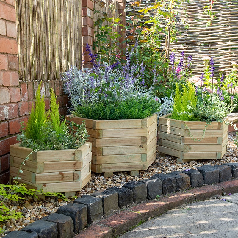 Product photograph of Forest York Hexagonal Wooden Garden Planter 3 X1 8 0 9x0 5m - Set Of 3 from Buy Sheds Direct