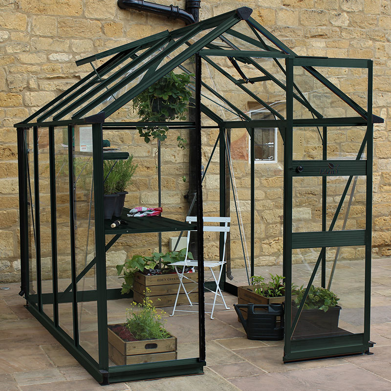 Product photograph of 6 X 8 Halls Cotswold Burford Small Greenhouse In Green With Toughened Glass 1 94m X 2 56m from Buy Sheds Direct