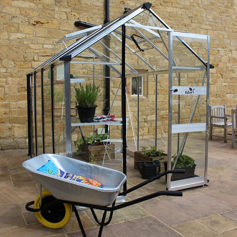 Product photograph of 6 X 10 Halls Cotswold Burford Small Greenhouse With Toughened Glass 1 94m X 3 17m from Buy Sheds Direct