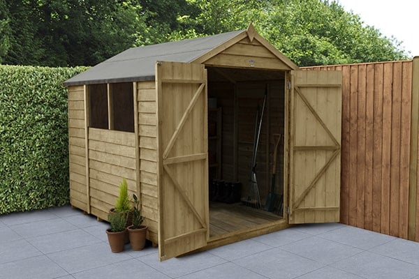 an 8x6 wooden shed in a garden setting