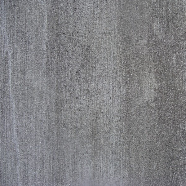 a close up of a flat, grey, concrete surface