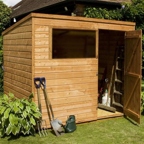 a pent dip treated shed with window and single door