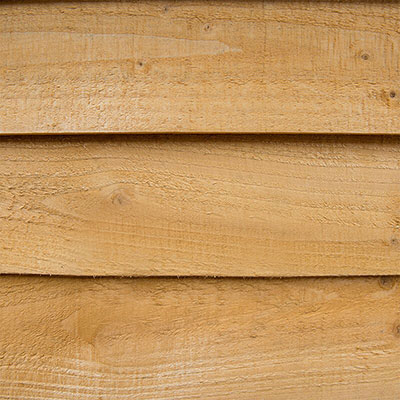 close-up shot of overlap cladding on a dip treated shed