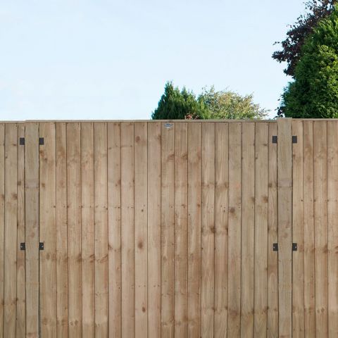 a pressure treated, featheredge fence panel