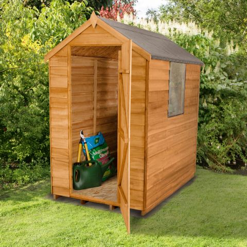 a small, single door wooden garden shed