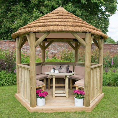a luxury wooden garden gazebo with thatched roof