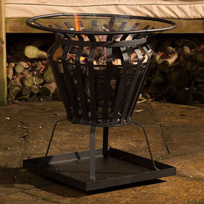 a black metal fire basket