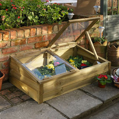 a large wooden cold frame