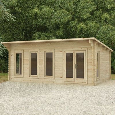 a log cabin garden office with glazed double doors and 4 large windows