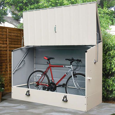 a cream metal bike storage unit with ramp