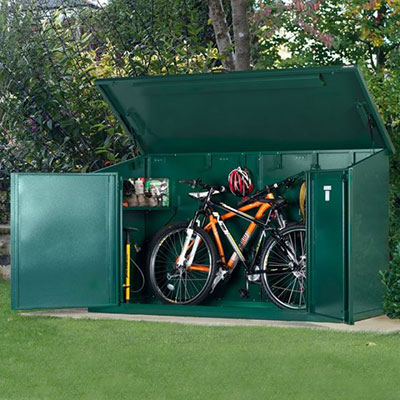 a green, metal electric bike shed containing 2 bicycles