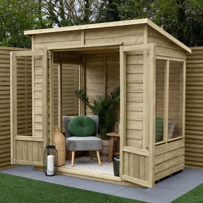 a small summerhouse with glazed double doors