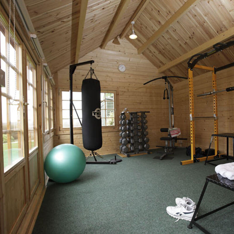 a Boxing Gym Set Up in a Log Cabin
