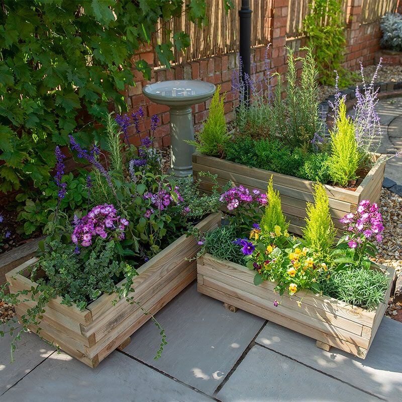 Click HERE to view this set of Wooden Planters from Forest
