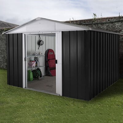 a dark-grey metal shed with sliding double doors