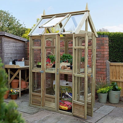 a tall, wooden, 3x4 greenhouse with multiple entrances and an automatic vent
