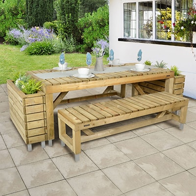 a wooden garden table, 2 matching benches and 2 wooden planters