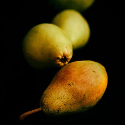 pears on a black background 
